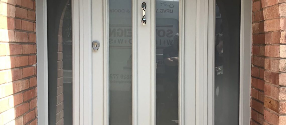 White uPVC door with two vertical windows in the centre