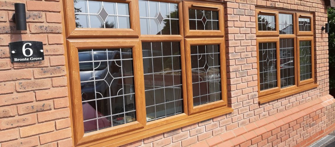 brown uPVC windows with piping