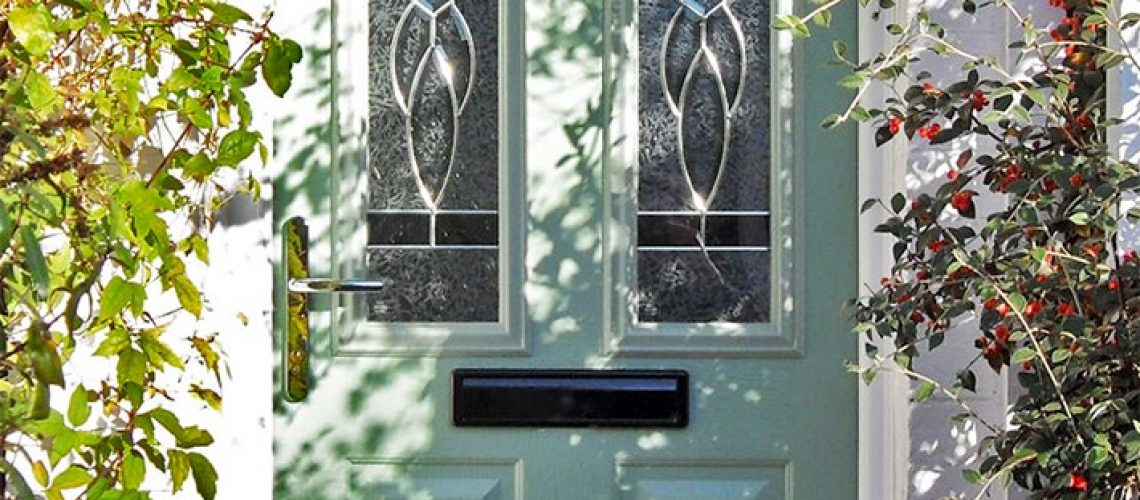 Sage Solidor door with two vertical arch glass panels